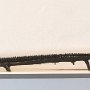Leslie Wilcox, "SMarmarie, Loathable Series," 2014, steel fireplace screen, driftwood, oil stain, 6 x 22 x 36 x 22 inches.
